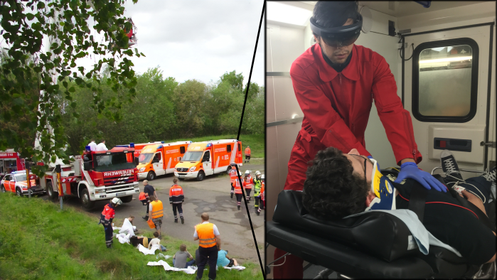 Sanitäter schaut mit einer AR-Brille auf einen Patienten, der vor ihm liegt. Im Hintergrund stehen mehrere Feuerwehrautos sowie  und es liegen mehrere verletzte Personen auf einer Wiese.